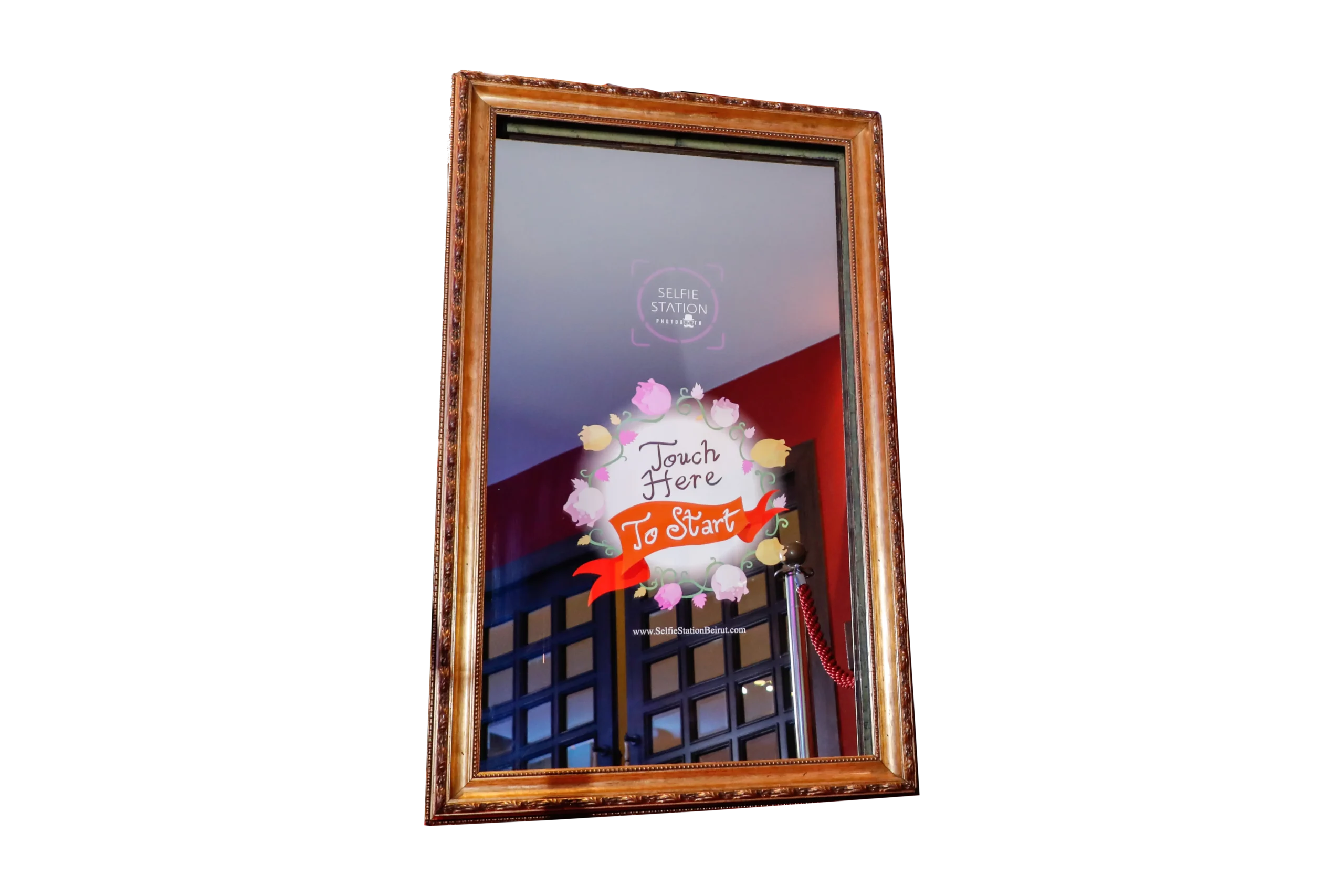 Royal Magic Mirror photobooth with elegant frame and interactive touchscreen display.